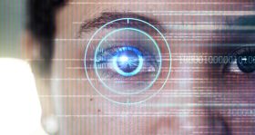 Biometric, digital and cyber security with eye scan of woman for identity, verification or facial recognition. Technology, future and ai with laser scanner focus of girl for hologram, contact or data