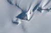 ANTARCTICA - JANUARY 19, 2019: DigitalGlobe satellite imagery of a pyramid-like mountain within the Heritage Mountain Range in Antarctica. Image-1.