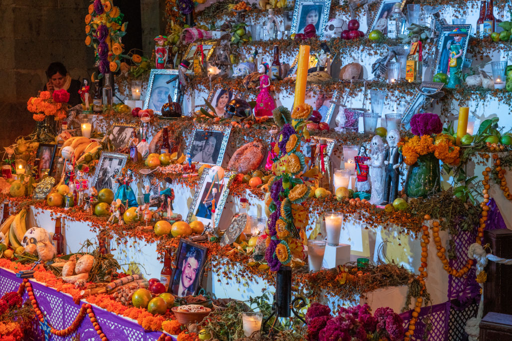 A large ofrenda in the Zocalo in front of the Metropolitan Cathedral to celebrate Day of the Dead in Oaxaca, Mexico