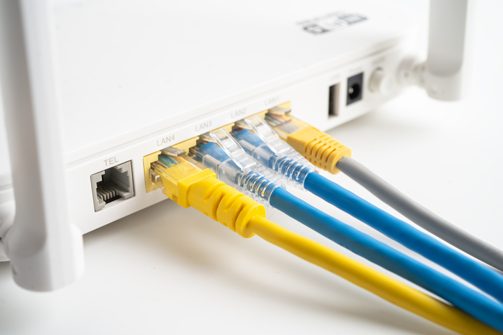 Ethernet cable with wireless router connect to internet service provider internet network.